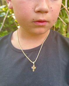 Our best-selling Cross Necklace! Flaunt your faith or gift the perfect protection cross necklace. This delicate 2mm Rope Chain with a delicate cross is the perfect necklace for a kid's everyday wear. Match your baby's necklace with an adult size.  Material: 18K Gold Filled. Our gold-filled pieces are bonded with 8 layers of real gold. This makes our jewelry high quality and long lasting and a great alternative to solid gold for a fraction of the price. Our pieces are 100% lead and nickel free ma Gold Cross Necklace With Nickel-free Cross Pendant, Spiritual Cross Pendant For First Communion, Gift Rope Chain Necklace With Cross Pendant, Rope Chain Necklace With Cross Pendant For Gift, Cross Necklace With Rope Chain As Gift, Gift Cross Pendant Necklace With Rope Chain, Necklace Christian, Baby Necklace, Godparent Gifts