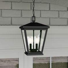 Refresh your home's exterior with the Joffrey collection of post, wall, and hanging outdoor lanterns. Clear seeded glass panels are highlighted by a Matte Black frame - providing both style and durability. With its classic square silhouette, Joffrey is fitting for a variety of exteriors. Quoizel Joffrey 2-Light Matte Black Transitional Seeded Glass Lantern Medium Outdoor Hanging Pendant Light | JFY1911MBK Hanging Tree Lights, Lantern Light Fixture, Hanging Lantern Lights, Black Outdoor Wall Lights, Outdoor Hanging Lanterns, Hanging Pendant Light, Led Outdoor Wall Lights, Lantern Lamp, Outdoor Light Fixtures