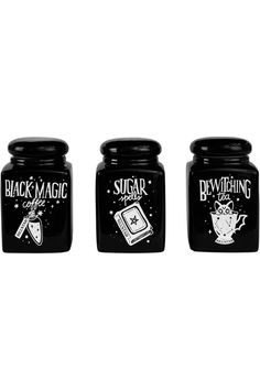 three black jars with white writing on them