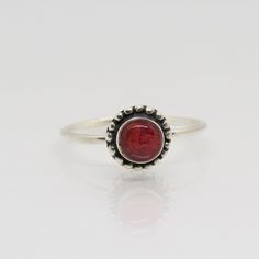 Vintage Bali Sterling Silver Red Coral Ring ...Marked 925....Total of weights 1.4grams...Size 7...Measure of Face 7.8MM...It's in very good condition. Classic Adjustable Red Ring, Red Sterling Silver Round Rings, Red Enamel Ring With Gemstone Gift, Red Enamel Gemstone Ring For Gift, Red Gemstone Enamel Ring Gift, Classic Red Ruby Stackable Rings, Stackable Red Ruby Ring, Red Gemstone Rings In Sterling Silver, Classic Red Birthstone Stackable Rings