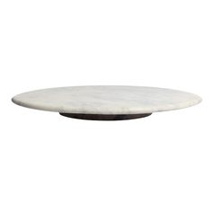 an oval marble table top on a white background