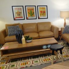 a living room with two couches and a coffee table