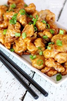 orange chicken copycat recipe on a plate with chopsticks