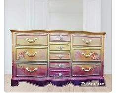 an old dresser has been painted purple and gold