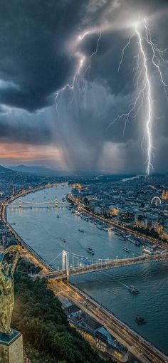 a lightning bolt is seen over the city and bay area in this aerial photo taken from an observation point