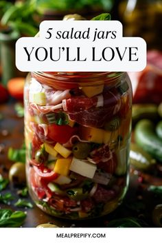 a jar filled with lots of different types of food and the words 5 salad jars you'll love