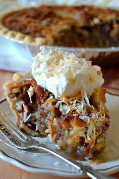 a piece of pie on a plate with a fork next to it and another pie in the background