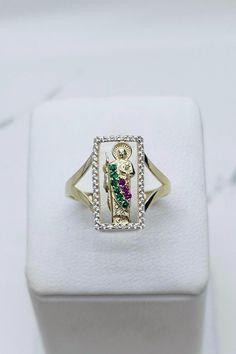 14k solid gold ring St Jude - San Judas  Yellow gold Fine Jewelry  Stones are cubic zirconia  St Jude  ❤️ 1 - Size 7.5 SKU 02212 ❤️2 - Size 7 - SKU 122662 ❤️3 -  30mm long Size 7 - SKU 52663 ❤️ 4 - 20mm long Size 8 - SKU 081753 ❤️ 5 - 20mm long Size 8 - SKU 091824 Check out my other jewelry  Anillo de San Judas de 14 Kilates oro sólido  Joyería fina  Oro auténtico  Piedras zirconia  ❤️ 1 -  Tamaño 7.5 - SKU 02212 ❤️ 2 - Tamaño 7 - SKU 122662 ❤️ 3 -  30 milímetros de largo - Tamaño 7 - SKU 52663 ❤️ 4 - 20 milímetros de largo - Tamaño 8 - SKU 081753 ❤️ 5 - 20 milímetros de largo - Tamaño 8 - SKU 091824 14k Gold Multi-stone Ring, Gold Emerald-cut Cubic Zirconia Birthstone Ring, Gold Emerald Cut Cubic Zirconia Birthstone Ring, 14k Gold Diamond Cut Ring For May Birthstone, Gold Multi-stone Diamond Promise Ring, Gold Emerald Cut Birthstone Ring With Vvs Clarity, Gold Cluster Ring With Cubic Zirconia Stamped 14k, Gold Cluster Ring With Emerald Cut, Gold Multi-stone Cluster Promise Ring