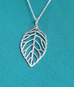 "All pieces are sent in a giftbox and placed in a netted, organza bag, ready for gift giving! Sweet sterling silver leaf pendant with 16\"-18\" - depending on availability and styles of chain may differ. Chain included. Chain styles may vary." Silver Leaf-shaped Necklaces For Gift, Silver Leaf-shaped Necklace Gift, Silver Leaf-shaped Necklace For Gift, Hypoallergenic Leaf-shaped Jewelry Gift, Handmade Silver Leaf-shaped Necklace, Sterling Silver Leaf Necklace, Sand Dollar Necklace, Pendant With Chain, Leaf Necklace