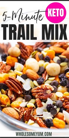 a glass bowl filled with trail mix