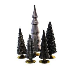 three black and gold christmas trees sitting on top of each other