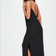 Brand New With Tag Look Sleek And On Fleek Wearing This Versatile Black Dress - Featuring A Maxi Length, Low Back And Cami Style. Regular / Stretch Fit Black Slip Dress With Side Slits, Black Maxi Dress With Side Slits And Spaghetti Straps, Chic Black Slip Dress With Side Slits, Chic Longline Maxi Dress For Party, Black Midi Slip Dress For Vacation, Chic Black Slip Dress For Vacation, Black Longline Party Dress, Black Midi Slip Dress For Beach, Black Longline Dress For Date Night