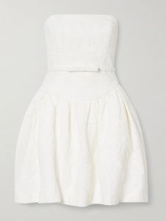 Self-Portait's mini dress is such a sweet choice for modern brides – plus it's the kind of style that'll work long after your big day too. It's made from cream crepe that's overlaid with pretty floral lace and has a strapless bodice adorned with a bow. The gathered waist emphasizes the full skirt.