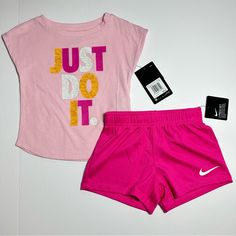 Nike Little Kids Just Do It 2 Piece Tee And Shorts Set!!! **Price Is Firm** No Offers, Ty! Only Discount Is The 5% Bundle Discount Brand New With Tags! A Cool Graphic Nike Tee And Stylish Nike Shorts Make This Nike Set An Easy Choice To Pull Together For Her Active Days. You Choose Size! Available In Toddlers Size 3t Or 4t Tee: Nike Tee, Barely There Sleeves, Just Do It Graphic On Front And 60% Cotton 40% Polyester. Shorts: Nike Mesh Shorts, Elastic Waist, Nike Swoosh Logo On Left Leg, And 100% Playful Sports Cotton Sets, Nike Summer Sets With Short Sleeves, Playful Pink Short Set With Short Sleeves, Playful Pink Short Sleeve Short Set, Pink Short Top For Playwear, Short Pink Tops For Playwear, Nike Cotton Playtime Sets, Nike Sets With Letter Print And Short Sleeve, Nike Short Sleeve Sets For Spring