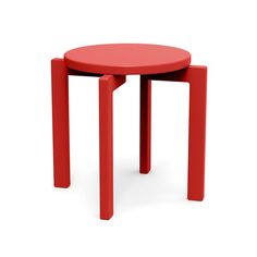 a small red table sitting on top of a white floor