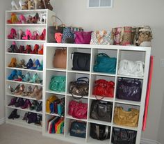 a white shelf filled with lots of purses and handbags