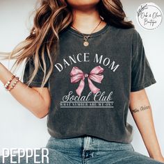 Show your love for all things dance with our stylish and comfortable t-shirt collection on Etsy, featuring unique designs inspired by various dance genres. Great for gifting for recitals, competitions, or any dance function. From graceful ballet to dynamic hip-hop, our premium quality t-shirts are perfect for dancers looking to showcase their passion with flair. **See something you like, but want it customized to fit your vision? Message me SHIRT -Comfort Colors, Garment-Dyed T-Shirt -Unisex Adu Drill Team Mom Shirts, Short Sleeve Tops With Graphic Print For Dance Class, Short Sleeve Graphic Print Tops For Dance, Casual Pink Tops For Dance, Pink Letter Print Top For Dance, Pink Graphic Print Top For Dance Class, Fitted Graphic Print Top For Dance, Fitted Hip Hop T-shirt For Dance, Summer Crew Neck Tops For Dance Class