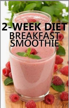 a smoothie with raspberries in it and the words 2 - week diet breakfast smoothie