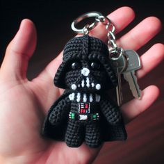 a crocheted keychain with a darth vader character on it