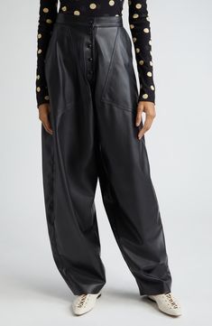 Angled oversized pockets complement the voluminous silhouette of these faux-leather balloon-leg pants featured in the designer's spring '24 runway show. 32" inseam; 19" leg opening; 15 1/2" front rise; 15 1/2" back rise (size 44 IT) Front snap closure Front patch pockets 100% polyester Dry clean Made in Italy Designer Clothing