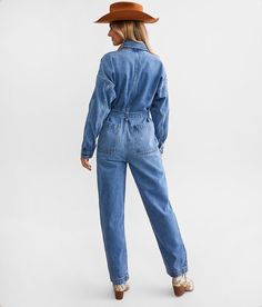 Ariat Georgia Denim Jumpsuit - Blue Large, Women's Denim 100% Cotton (Non-Stretch) - Rigid denim holds its shape and fades beautifully over time this jumpsuit will be your go to for years to come. Finding the perfect size in these fits is all about your preference. For a bigger looser look you may want to size up or for a more fitted look order true to size. Hidden button down jumpsuit Front patch pockets Waist tie and destruction details Inseam measures 28 14 bottom opening Bust measures 36 on Utility High Rise Denim Jumpsuits And Rompers, High Rise Denim Utility Jumpsuits And Rompers, Utility High-rise Denim Jumpsuits And Rompers, High Rise Relaxed Fit Jumpsuits And Rompers For Fall, High Rise Relaxed Fit Jumpsuits For Fall, Fall High Rise Relaxed Fit Jumpsuits And Rompers, Medium Wash Relaxed Fit Denim Jumpsuits And Rompers, Utility Medium Wash Denim Overall Jumpsuit, Utility Medium Wash Denim Overalls