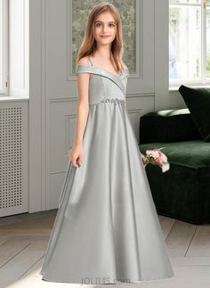 Kaya Ball-Gown/Princess Off-the-Shoulder Floor-Length Satin Junior Bridesmaid Dress UKP0013404 Silhouette:: Ball-Gown/Princess Neckline:: Off-the-Shoulder Length:: Floor-Length Fabric:: Satin Straps:: SpaghettiStraps Sleeve:: Sleeveless BackStyle:: ZipperUp FullyLined:: Yes Size:: General,Plus Season:: Fall,Spring,Summer,Winter This dress could be custom made, there are no extra cost to do custom size and color. Off-shoulder Ball Gown For Debutante Ball, Off-shoulder Ball Gown With Fitted Bodice, Silver Off-shoulder Dress, Princess Bridesmaid Dress, Stylish Prom Dress, Gown Princess, Prom Dresses Long Lace, Ball Gowns Princess, Sleeveless Bridesmaid Dresses