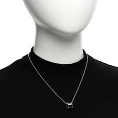 This is an authentic BULGARI Sterling Silver Ceramic Save The Children Pendant Necklace. The necklace is crafted of sterling silver and features a black ceramic B.zero1 barrel motif framed by the BVLGARI logo engraved on either side. Bvlgari Logo, Black Ceramic, A Black, Barrel, Pendant Necklace, Ceramics, Sterling Silver, Pendant, Silver