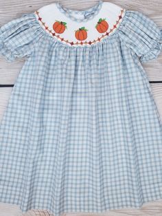 Three Sisters Pumpkin Smocked Bishop Dress Fall Smocked Dress With Short Sleeves, Gingham Short Sleeve Dress With Smocked Bodice, Fitted Smocked Dress For Fall, Cotton Fitted Smocked Dress, Short Sleeve Gingham Smock Dress, Short Sleeve Gingham Dress With Smocked Bodice, Gingham Dress With Smocked Bodice And Short Sleeves, Fall Smock Dress With Short Sleeves, Fall Smocked Back Short Sleeve Top