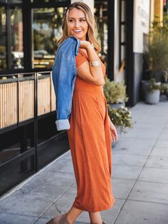 These oh-so comfy jumpsuits are sure to become your favorite piece! Available in tons of colors you can style it so many ways. Add a jean jacket and sneakers or dress it up with a statement necklace and heels. Sizing Small 0-4 Medium 6-8 Large 10-12 XL 12-14 Models are 5'4" wearing size small Orange Stretch Jumpsuits And Rompers For Spring, Casual Short Sleeve Jumpsuits And Rompers For Spring, Casual Fall Jumpsuits And Rompers For Loungewear, Casual Fall Loungewear Jumpsuits And Rompers, Casual Non-stretch Jumpsuits And Rompers In Solid Color, Casual Relaxed Fit Maxi Jumpsuits And Rompers, Casual Non-stretch Solid Jumpsuits And Rompers, Casual Short Sleeve Jumpsuits And Rompers, Casual Maxi-length Relaxed Fit Jumpsuits And Rompers