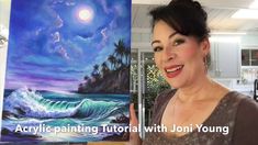 a woman standing in front of a painting with the words acrylic painting tutorial with jon young