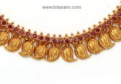 22 karat gold "mango" necklace & earrings set with color stones (temple jewellery)

introducing the exquisite 22 karat gold "mango" necklace & earrings set with color stones, a stunning piece of temple jewellery brought to you by totaram jewelers. handcrafted in india, this intricately designed set is a true testament to the rich heritage of indian jewelry.
  
  made with the finest quality 22 karat gold, this necklace and earrings set exudes elegance and charm. the total gross gold Traditional Gold Temple Necklace For Anniversary, 22k Gold Temple Jewelry Sets For Anniversary, 22k Gold Temple Necklace With Intricate Design For Anniversary, 22k Gold Temple Jewelry Bridal Necklace For Anniversary, Festive 22k Gold Temple Necklace For Anniversary, Traditional 22k Gold Kundan Anniversary Necklace, Mango Necklace, Temple Jewelry Necklace, Color Stones