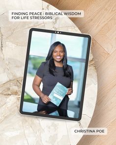 a woman holding a book in front of her face with the words finding peace biblical wisdom for