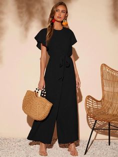 This elegant piece from our collection is a must-have for any wardrobe. Butterfly Sleeve Belted Wide Leg Jumpsuit is crafted from a lightweight fabric, the wide-leg silhouette is enhanced by a belted waistline and regular fit. Featuring a round neckline, short butterfly sleeves, and a long length, this piece is sure to bring a touch of sophistication to any look. It's perfect for any formal occasion or just to add some flair to your everyday style coming in black and brown colors. Features: Styl Chic Belted Jumpsuits And Rompers, Summer Workwear Jumpsuits And Rompers With Belt, Summer Workwear Belted Jumpsuits And Rompers, Chic Belted Jumpsuits And Rompers For Spring, Elegant Belted Solid Jumpsuits And Rompers, Chic Jumpsuits And Rompers With Tie Waist Maxi Length, Chic Wide Leg Jumpsuit With Tie Waist, Chic Wide Leg Jumpsuits And Rompers With Tie Waist, Elegant Wide Leg Belted Jumpsuits And Rompers