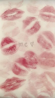 the words me v written in red ink on a white background with lipstick imprints