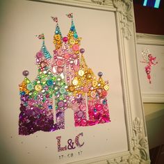 there is a picture of a princess castle made out of sequins and buttons