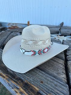 This Longhorn beaded hat band will bring to your western look. Featuring bright, intricate beading, this hat band will bring a pop of color and texture to your wardrobe. Make a statement with this unique accessory. -The Beaded Portion of the Hat band is 20 inches. -The leather adds a extra 14 inches. The leather ties make the hat band adjustable to your hat. -The length of the entire band is 34 inches. (Hat is not included) I do the Beaded work and my boyfriend does the leather work of the hat b Luxury Western Hat Bands For Outdoor, Luxury White Hat Bands For Ranch, Cowboy Hat Bands With Tabs, Beaded Hat Bands Hats, Cheap Casual Solid Color Hat Bands, Cheap Classic Hat Band, Adjustable Multicolor Hat For Western-themed Events, White Southwestern Fedora Hat Bands, Adjustable Multicolor Western Straw Hat