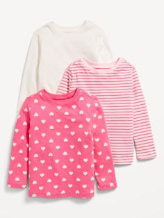 crew neck long sleeves graphic at front of online exclusive relaxed fit hits below waistmachine wash according to the care instruction label Playful White Long Sleeve T-shirt, Cute Relaxed Fit Long Sleeve Tops, Cute Long Sleeve Relaxed Fit Tops, Cute Long Sleeve Tops With Relaxed Fit, Toddler Girl Shirts, Toddler Girls Clothes, Toddler Girl Clothing, Old Navy Toddler Girl, Girl Shirts