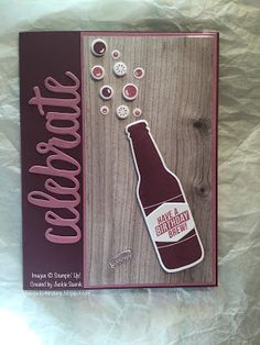 a card with buttons and a bottle on it