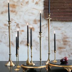 Each Antique Candlestick features a classic round foot that tapers up to a slim stem and is topped off with a perfect cup for holding a taper candle. 3.25in Dia x 11in H Finish: Gold or Silver Material: Metal Set of 2 Imported Shop more Hype Decor Antique Candle Sticks, Romantic Candles, Black Gold Jewelry, Gold Candles, Mini Candles, Black Candles, Gothic Decor, Wedding Candles, Candle Set