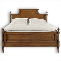 a wooden bed with white sheets and pillows on the headboard is in front of a red ribbon