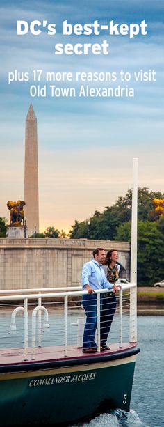 a man and woman standing on top of a boat