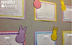 the bulletin board has been decorated with paper cutouts and bunnies on it,