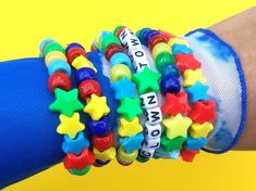 Playful Multicolor Letter Beads Friendship Bracelets, Fun Rainbow Friendship Bracelets With Letter Beads, Colorful Letter Beads Friendship Bracelets, Colorful Fun Friendship Bracelets With Letter Beads, Cute Multicolor Star-shaped Beaded Bracelets, Fun Plastic Beaded Bracelets With Letter Beads, Fun Beaded Bracelets For Birthday, Fun Colorful Beaded Bracelets With Letter Beads, Colorful Fun Beaded Bracelets With Letter Beads