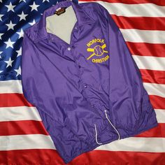 a purple jacket with the words north carolina on it and an american flag in the background