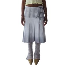 Designed and handmade in Toronto by CPW creator Alexandria Ferdinand. - Pleated crossover skirt with 3 tie closures - Features a pintuck top yoke & wide box pleat bottom - Hand-dyed with dip dye finish by the hem - Shown on a size small model - 100% cotton yarn In making a purchase, you are directly supporting smal Fitted Accordion Pleats Daywear Skirt, Fitted Accordion Pleats Pleated Skirt For Daywear, Fitted Accordion Pleated Skirt For Daywear, Fitted Cotton Pleated Skirt With Gathered Details, Fitted Cotton Pleated Skirt For Daywear, Crossover Skirt, Tie Skirt, Box Pleats, Dip Dye