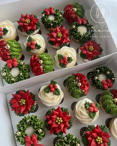 the cupcakes are decorated with poinsettis and greenery on them