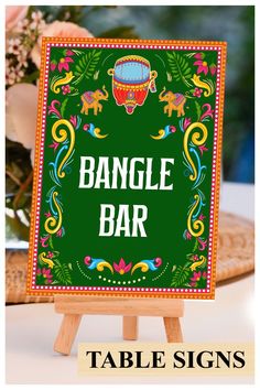 This beautiful Bangle station sign or Indian wedding decor sign with mandala, from our Ethnic Fusion collection, lovingly created by us, is for those who would like to leave, not only a subtle, but also an impactful impression on their guests!

Bangle station signs Bindi Bar signs, Bindi station sign Bangle bar sign Mehndi decoration, Mehndi decor as Haldi decor & Food station sign Food Station Signs, Henna Station, Mehendi Decoration, Indian Diy, Mehndi Decoration, Bangle Bar, Indian Mehendi, Stall Decorations, Bangle Ceremony