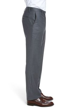 Stretch-infused wool gabardine defines handsome trousers crafted in a crisp, versatile flat-front cut. 16 1/2" leg opening; 9 1/4" front rise; 14 3/4" back rise Zip fly with button-tab closure Slant pockets; back button-closure welt pockets Unhemmed. These trousers can be hemmed for free at your local Nordstrom. Find a store Lined to the knee 98% wool, 2% spandex Dry clean Imported Men's Clothing Solid Wool Pants With Welt Pockets, Wool Pants With Welt Pockets, Full Length Solid Wool Pants, Solid Full-length Wool Pants, Full Length Wool Pants, Custom Fit Pants With Welt Pockets For Business Casual, Classic Wool Dress Pants For Formal Occasions, Solid Wool Dress Pants For Work, Classic Wool Dress Pants For Office