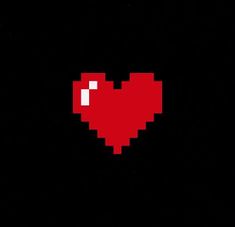 an image of a pixel heart in the dark