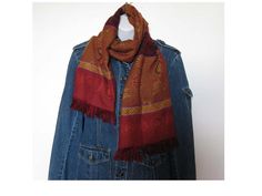 Beautiful lightweight 90s hippie boho scarf. Perfect item to accessorize your outfits! Jean jacket not included Colors: burgundy, gold Material: acrylic Measurements: Length 58'' Width 15.5'' Vintage condition: overall good....a few loose threads machine wash in cold water / tumble dry at low temperature Ships out in 1-3 business days by Canada post Please read shipping and policies before buying Buy more and SAVE on shipping Gold Shawl For Fall, 90s Hippie, Indian Scarf, Rose Scarf, Skater Outfits, Boho Scarfs, Neck Accessories, Rayon Shirt, Vintage Silk Scarf